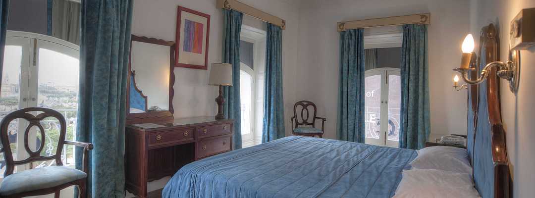 Spacious and bright Three Window room at Castille Hotel